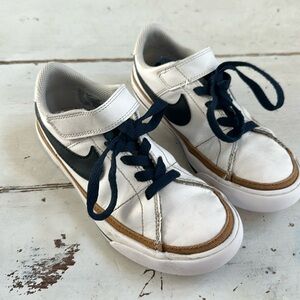 Nike Court kids size 1. White with black swoosh and navy laces.